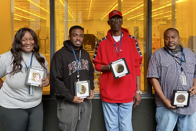 Group of recent graduates of the IMS veteran's program