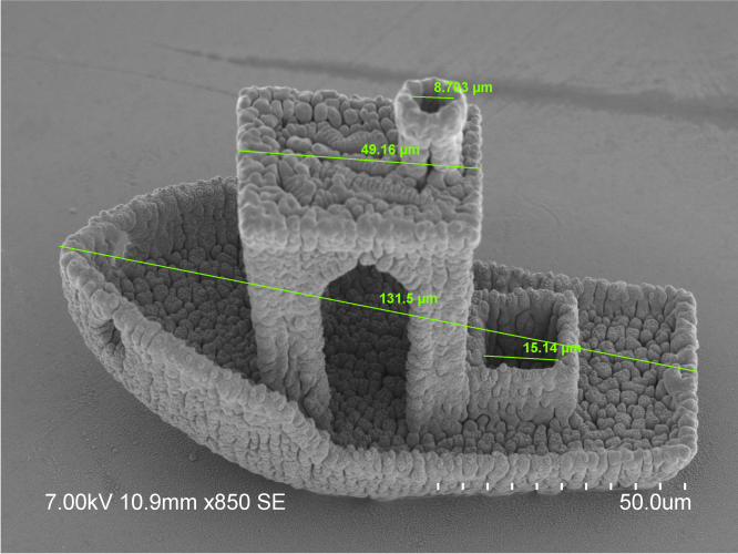 Microscope software interface displays a microfabricated structure alongside measurement, calibration, and image-analysis tools used during characterization. Detailed description required in adjacent page content.